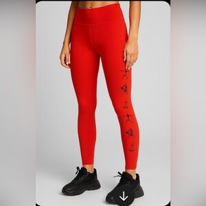 Bold Red Leggings with Black Graphic Details
